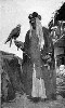 SAQAAR (223Wx369H) - Falconer from Samarra holding his falcon 