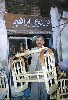 WOOD WORK (295Wx430H) - A wood work specialist showing a child rocking cradle 