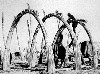 Arches (468Wx350H) - Erecting the arches while building a house of reeds. 